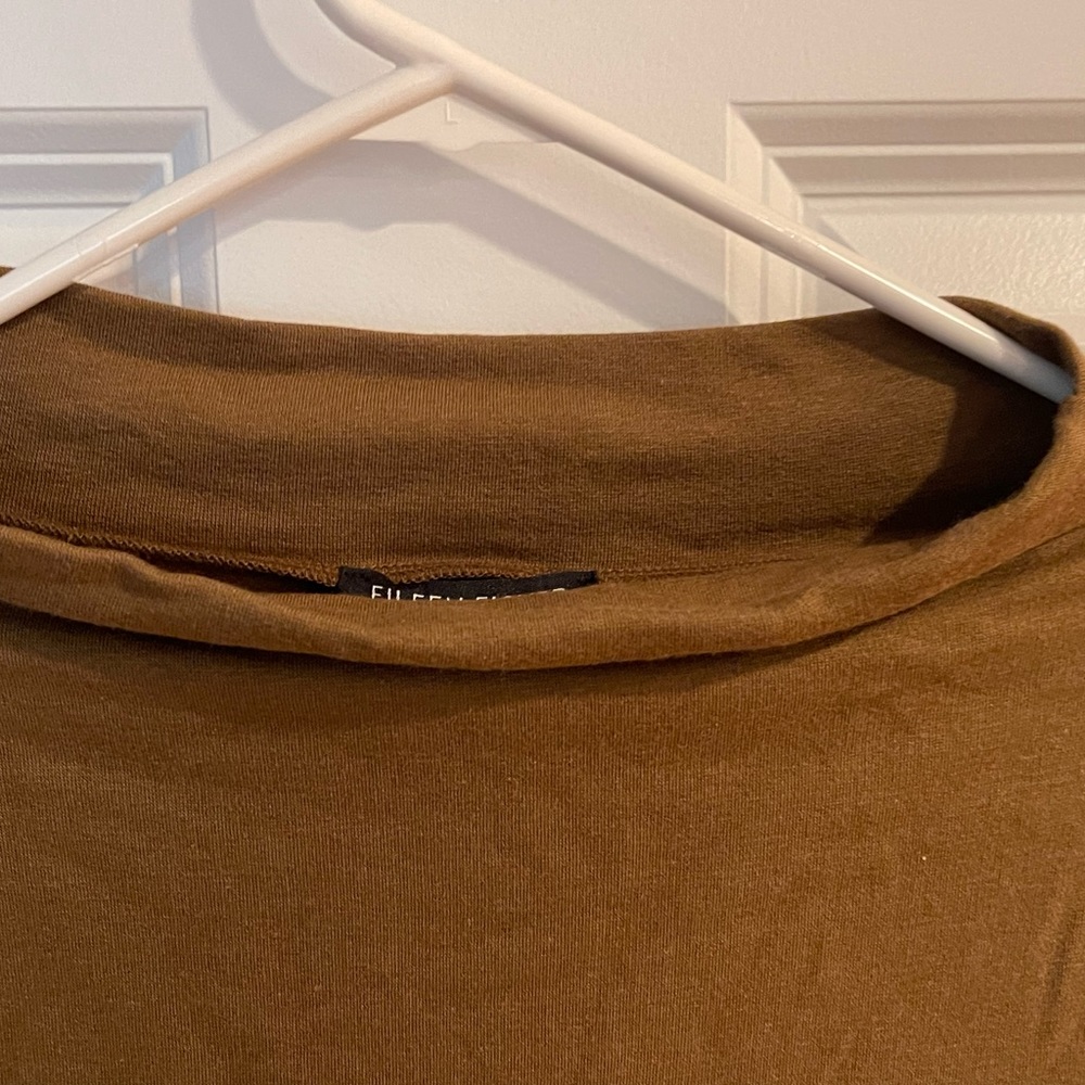 New with tags, never worn, woman’s tunic. Hazel. Perfect for any season.